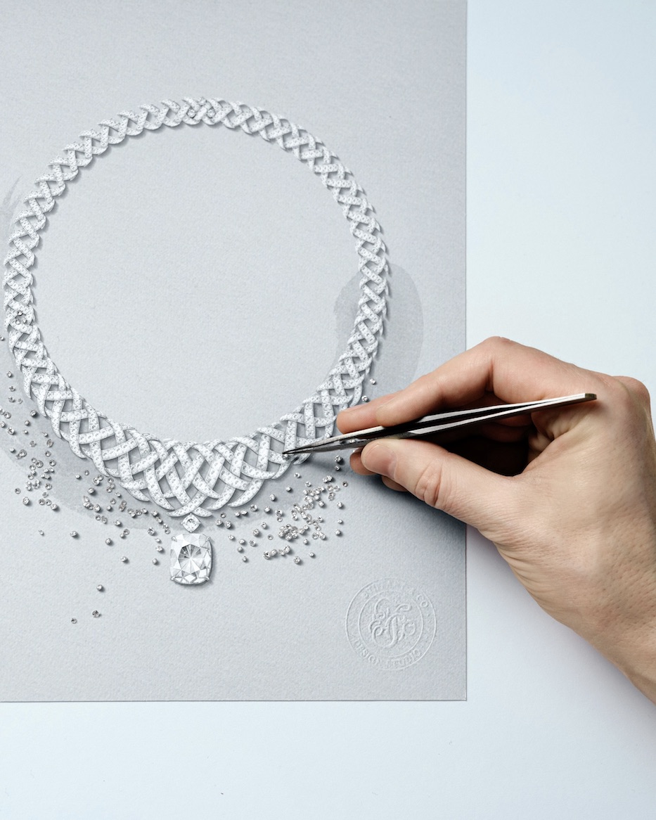 Handcrafting the Diamond Jasmine necklace from Blue Book 2026: Hidden Garden. An artisan compares diamond melee against the rendering.