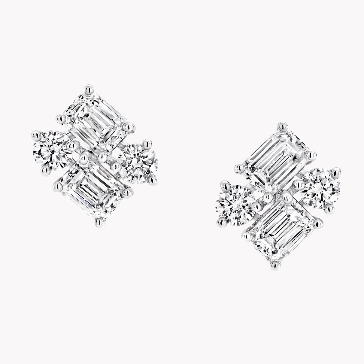 Graff Emerald Cut and Round Diamond Earrings, $29,300, graff.com