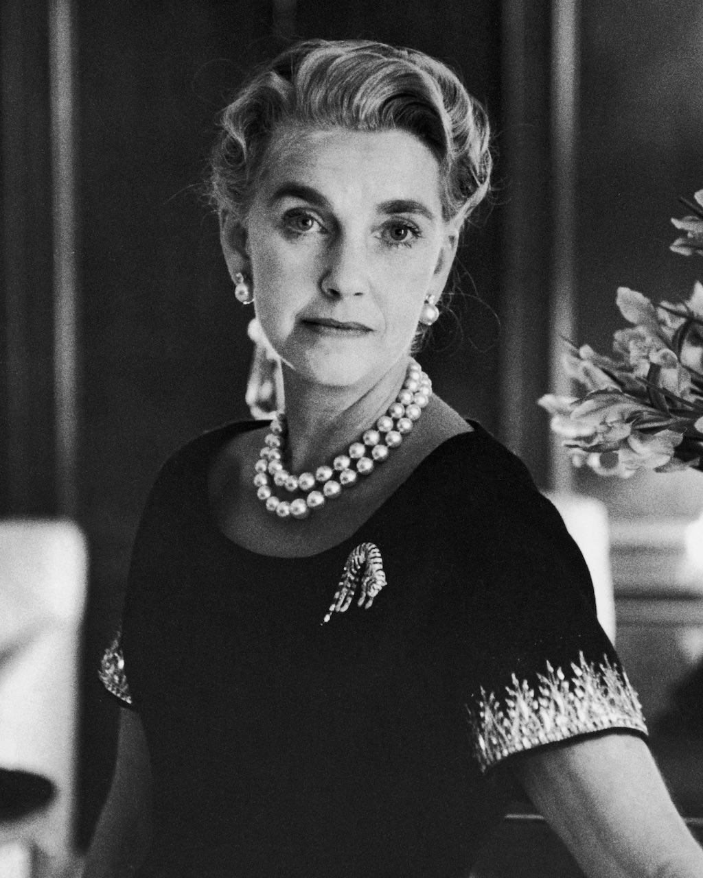 Barbara Hutton wears her Cartier Tiger brooch at her son's wedding.  
