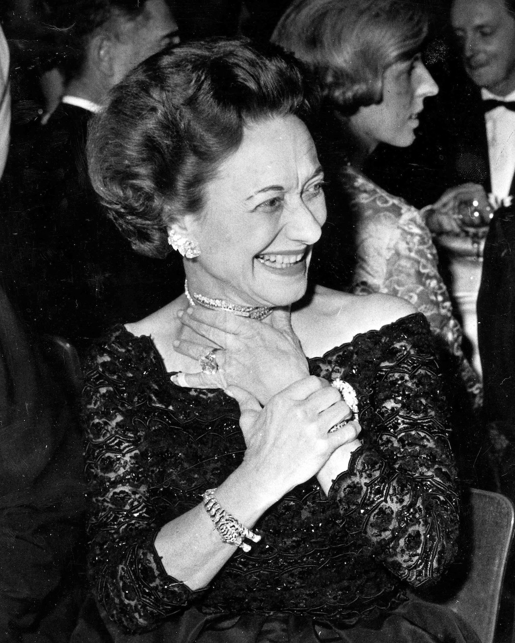 Wallis Simpson, the Duchess of Windsor, wears her Cartier Tiger bracelet at a party to celebrate the Gala Opening of the new Lido Revue in Paris on December 11, 1959. (Photo by Popperfoto via Getty Images)