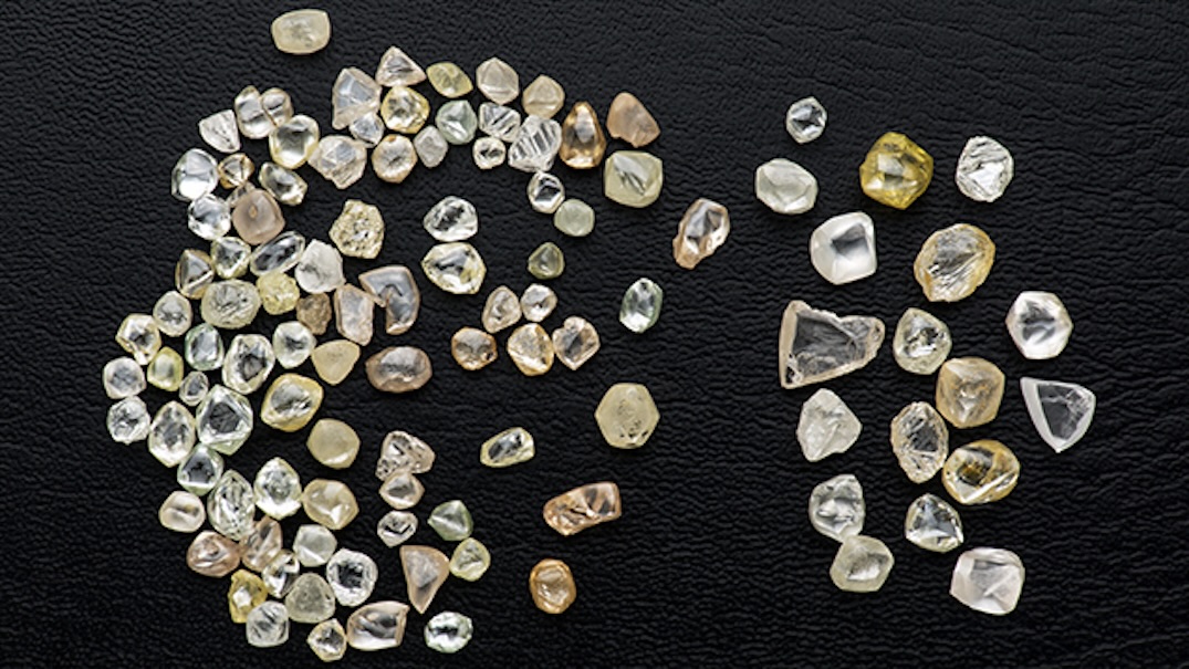 This selection of Brazilian diamonds, recovered from the Abaeté River in Minas Gerais, weighing a total of 77.82 carats, is typical of the material being found today in Brazil’s alluvial deposits. (Photo by Robert Weldon/GIA, courtesy of Giovani de Deus Borges.)