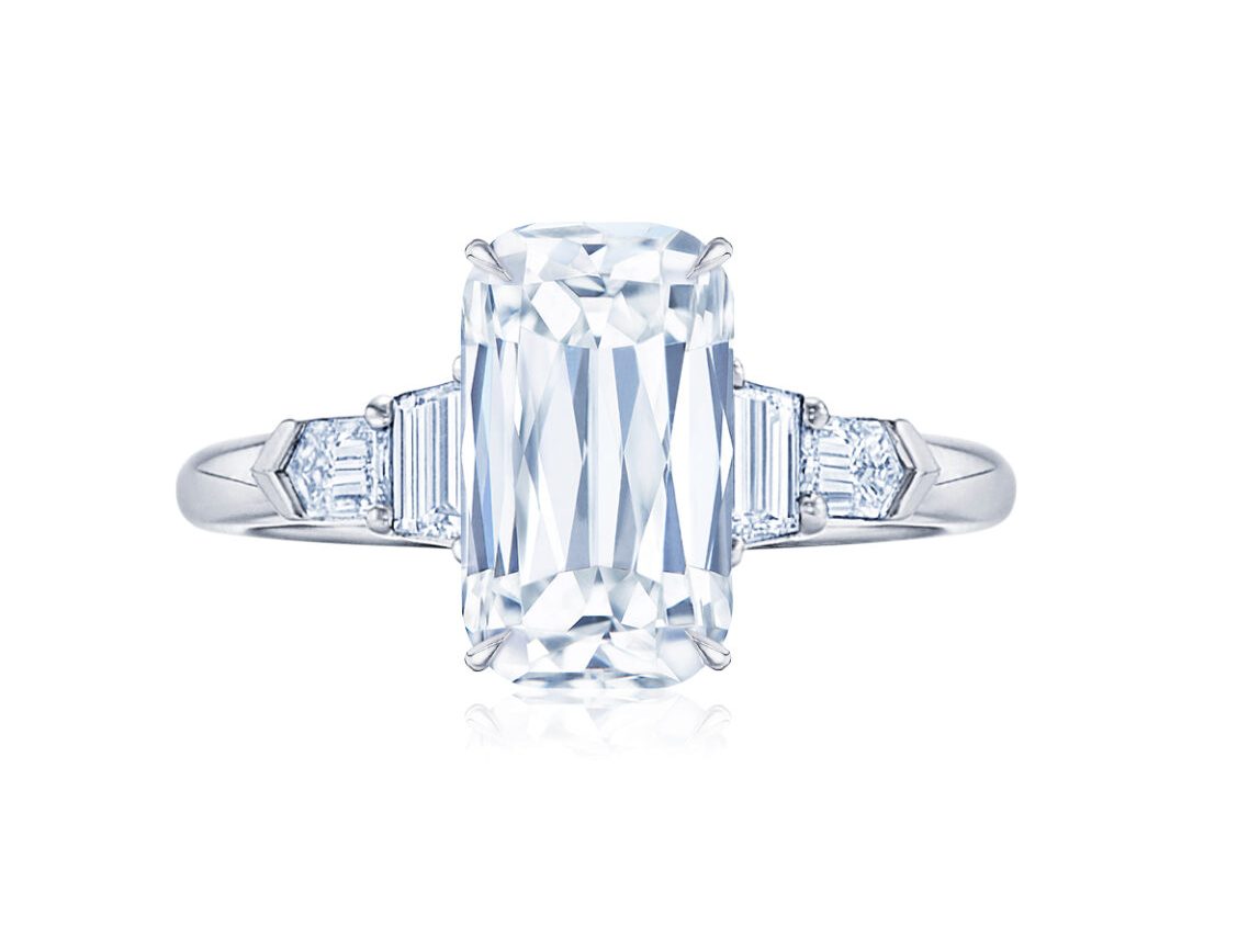 add side stones to make an engagement ring look bigger