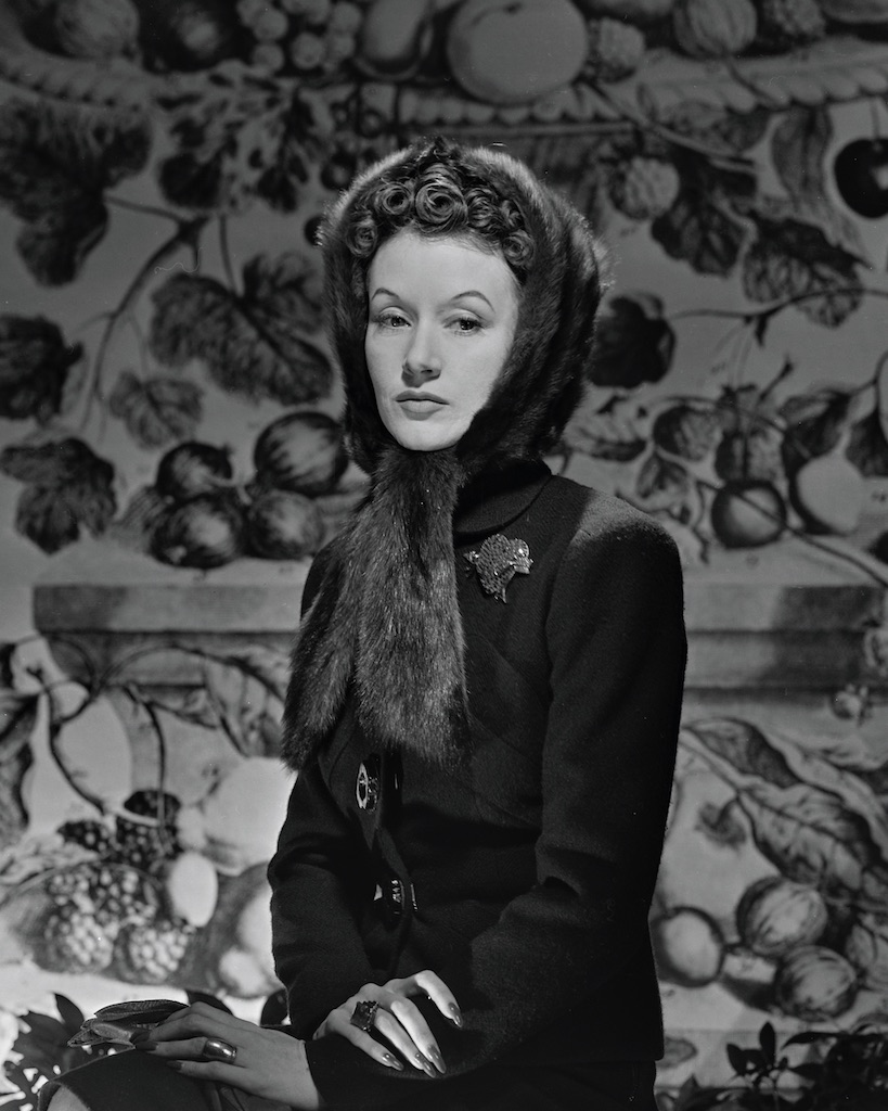 jewelry collectors Millicent Rogers wears her her heart-shaped brooch