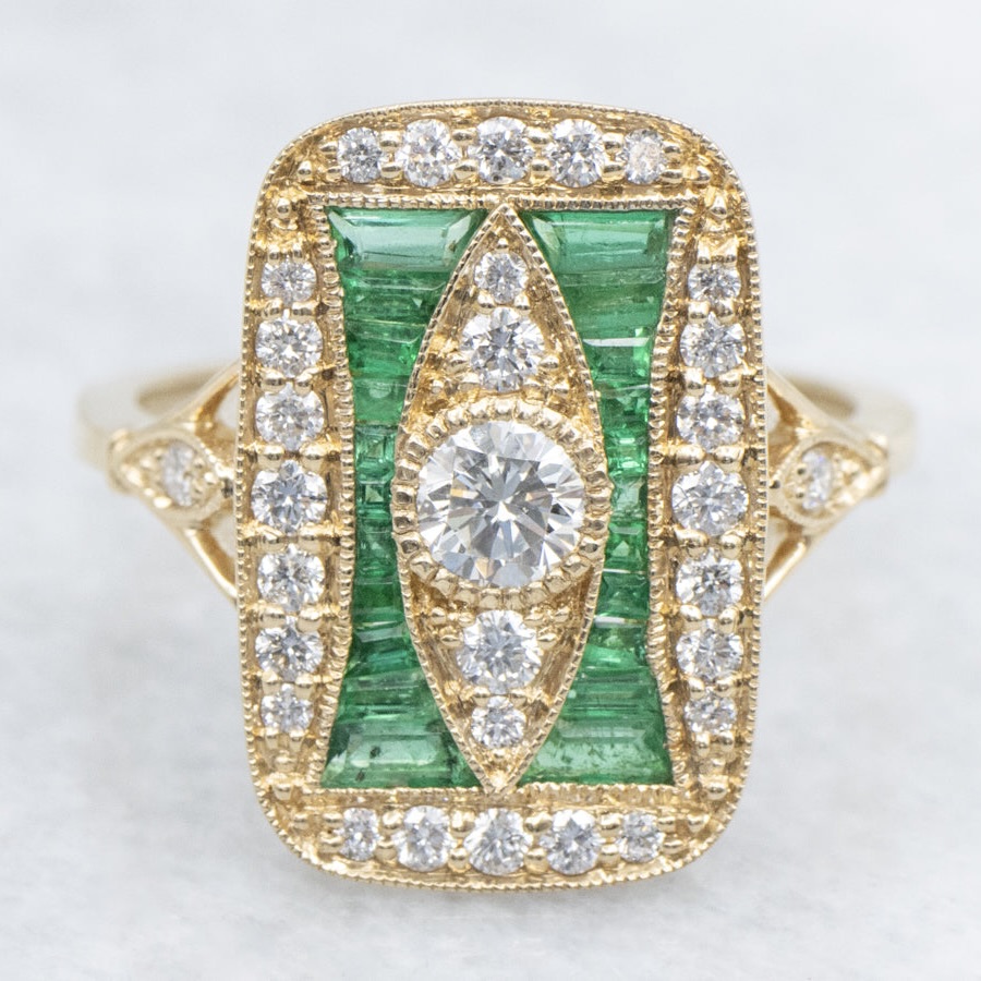 The McIntyre Emerald and Diamond Dinner Ring, $5,565, marketsquarejewelers.com