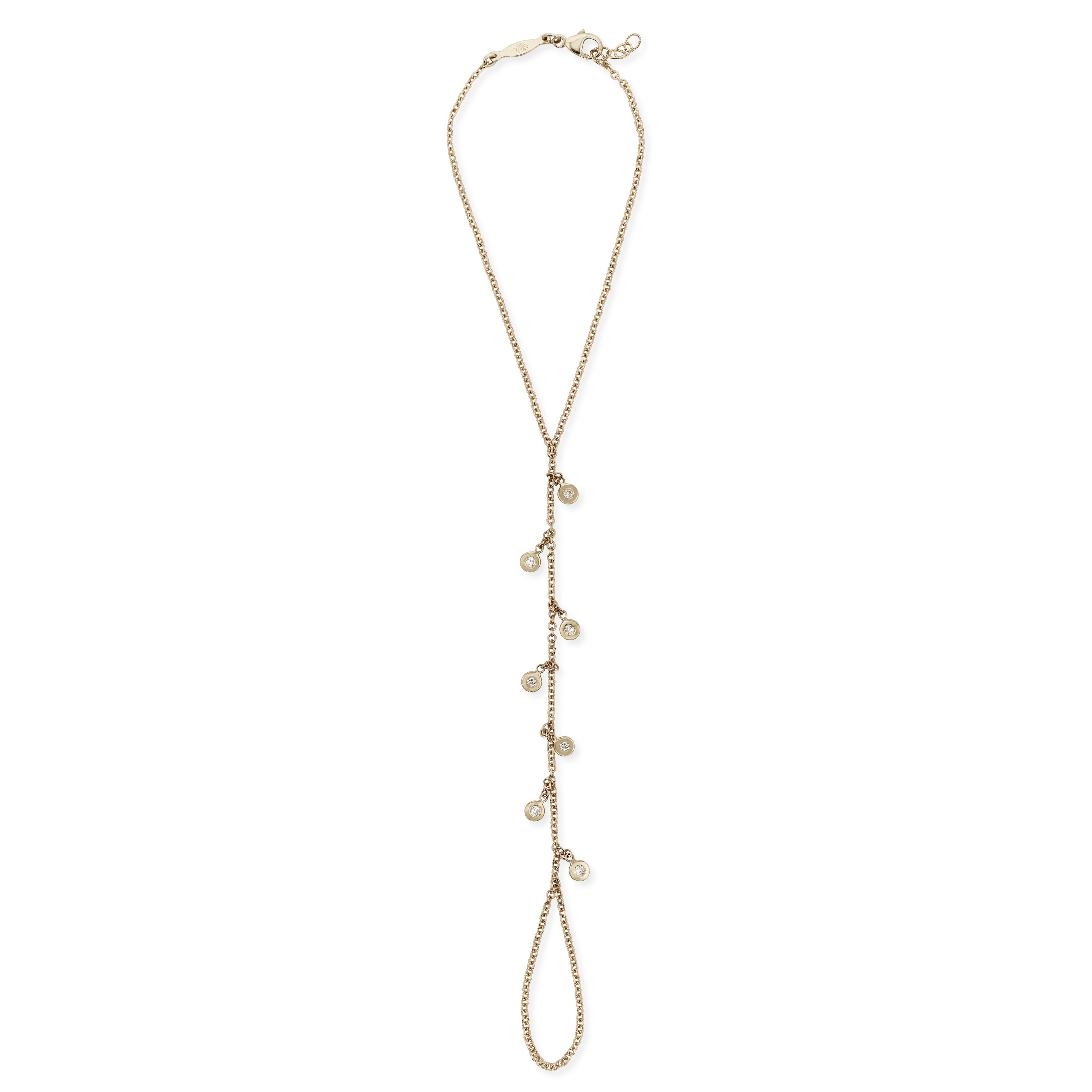 Diamond Hand Chain Jacquie Aiche 7 Diamond Shaker Finger Bracelet, $2,365, jacquieaiche.com