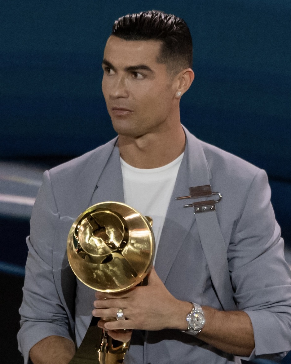 Cristiano Ronaldo receives an award during the Globe Soccer Dubai Awards 2024