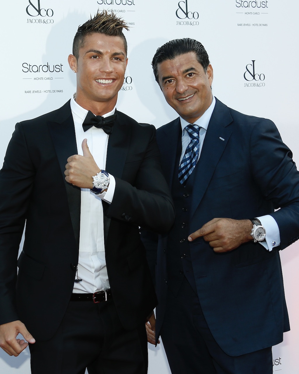 Portuguese football star Cristiano Ronaldo (L) poses with Bukharian-American jeweler and founder of "Jacob and Co", Jacob Arabo