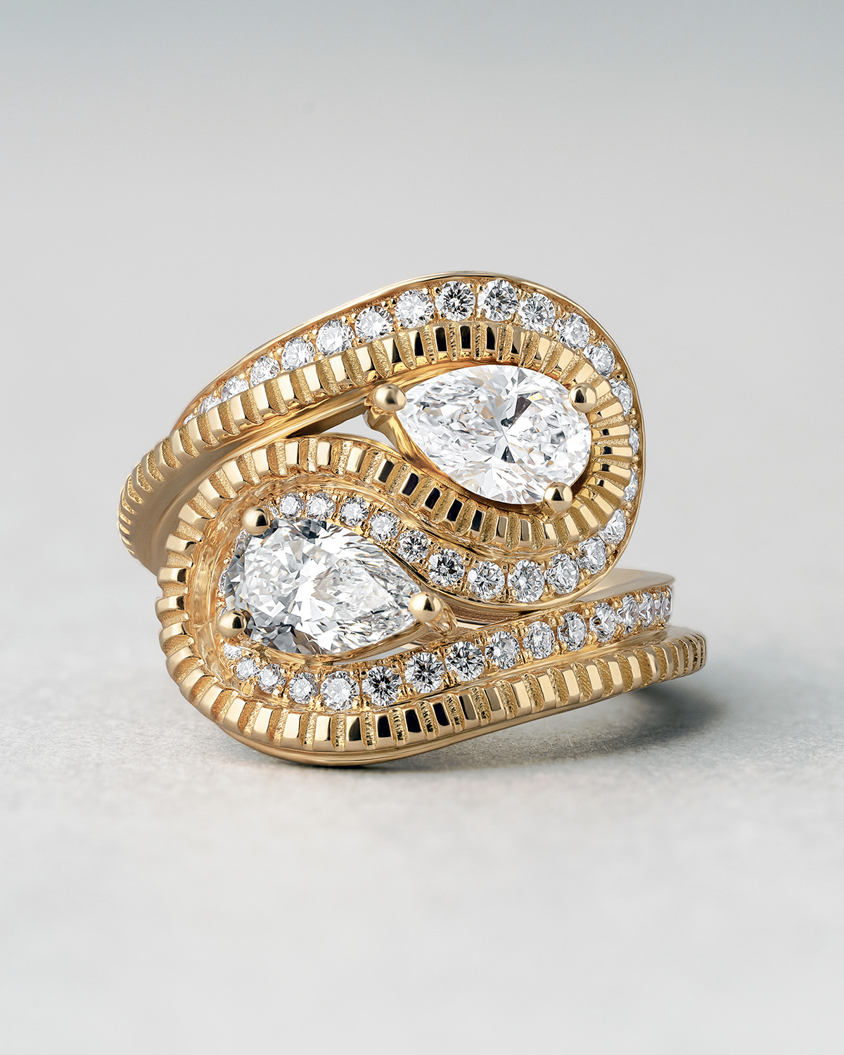 wavy ring with two diamonds