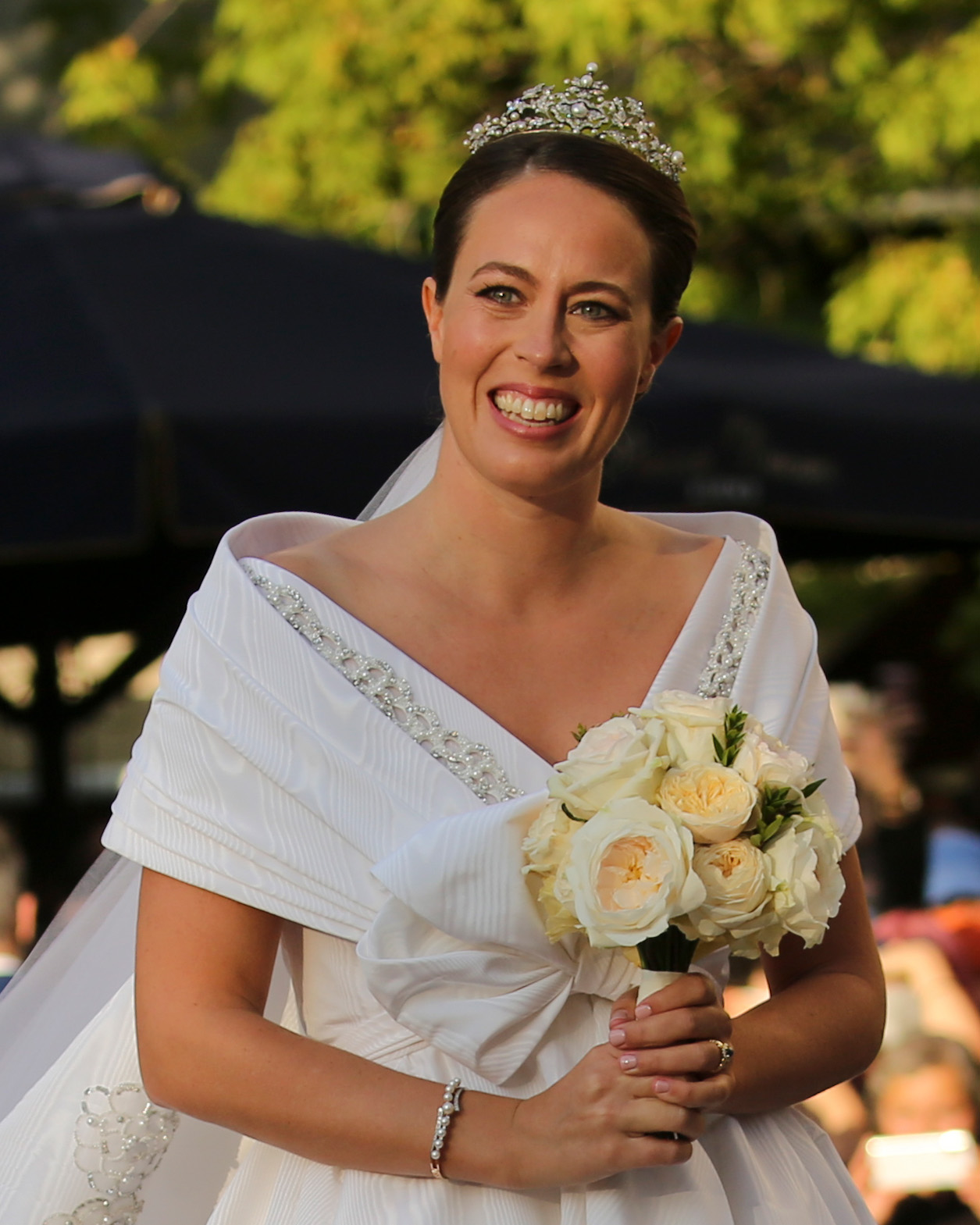 Nina Flohr arrives at the Annunciation Cathedral of St. Mary on October 23, 2021 in Athens, Greece wearing the Antique Corsage Tiara from the Greek Royal Jewelry