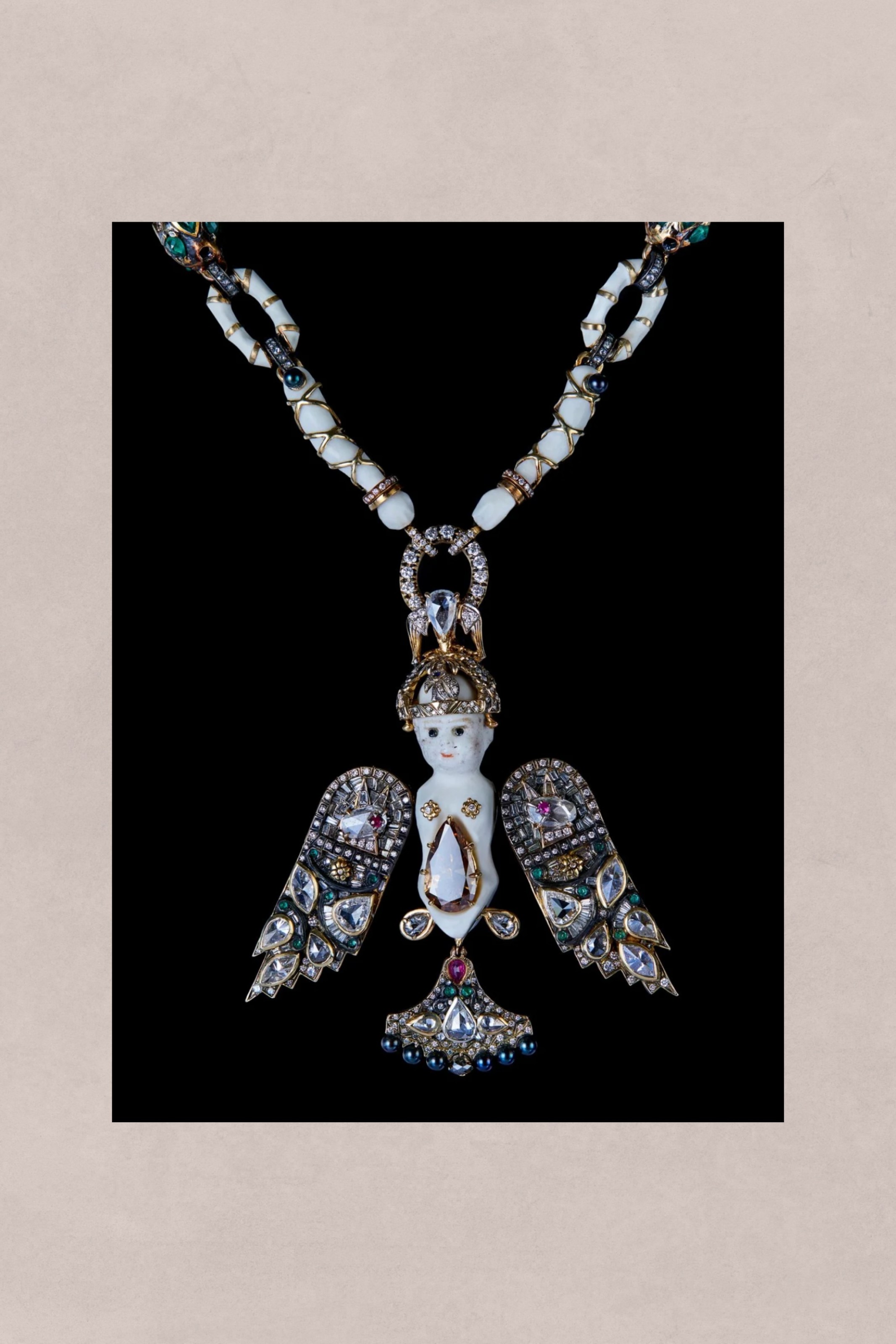 Natural diamond Falcon Crest pendant and Madonna 