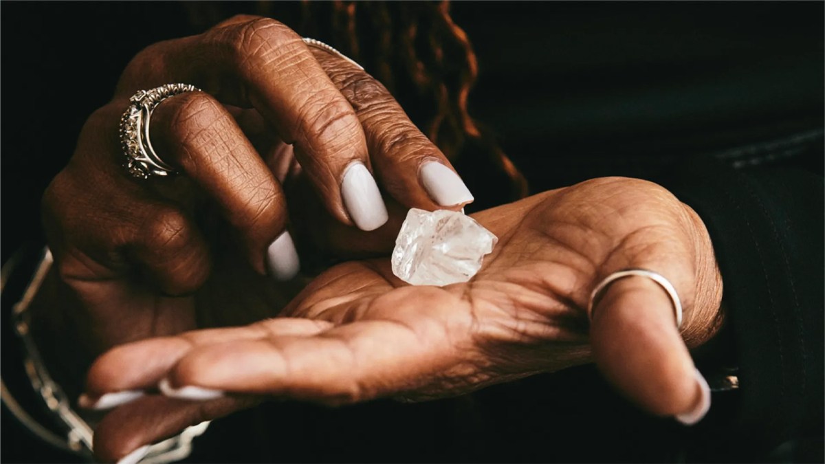 Rough natural diamond held in hands